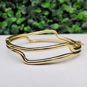 Vintage 14k gold wavy bangle